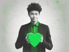 Image of a young leader holding a green heart